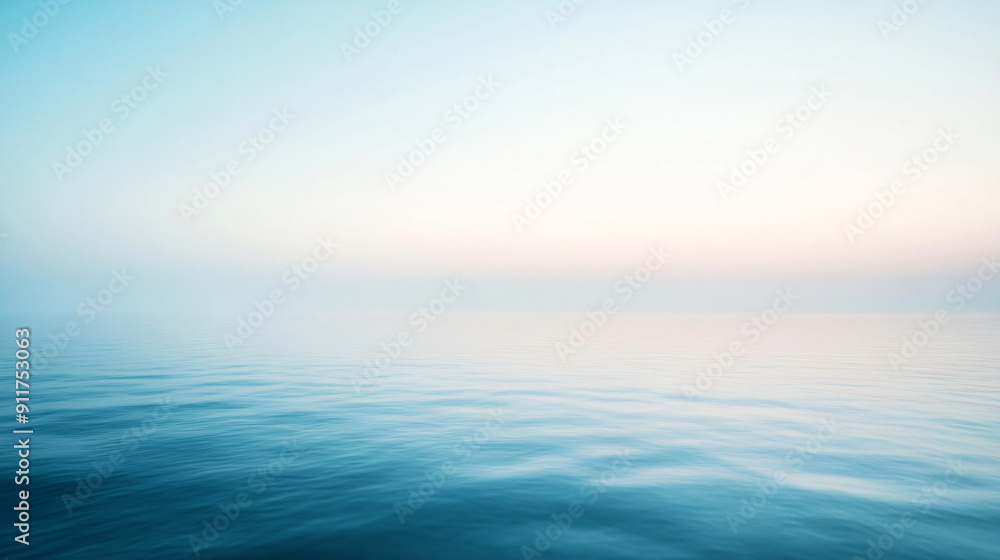 Fototapeta premium A blurred gradient background transitioning from white to blue, embodying a tranquil and creative concept.