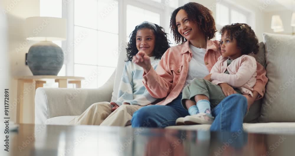 Mother, children and watching tv in home, laughing and funny joke or comedy for bonding. Mom, daughter and girl for series or cartoon movie, relax and kids for security in relationship or support Mother, children and watching tv in home, laughing and funny joke or comedy for bonding. Mom, daughter and girl for series or cartoon movie, relax and kids for security in relationship or support