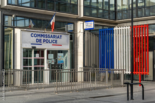 Paris, France - August 4, 2024: Commissariat de Police entrance with Blue White Red design in La Defense