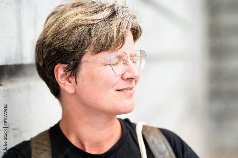 Portrait of a 38 yo white woman , contemplating eyes closed, Brussels, Belgium Portrait of a 38 yo white woman , contemplating eyes closed, Brussels, Belgium
