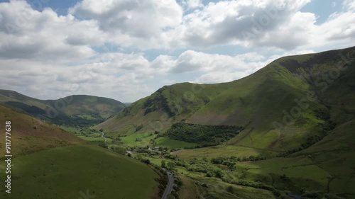 Aerial video over green fields in Mawddwy UK photo