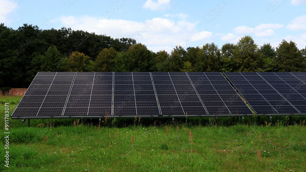 Solar Panel Array in a Green Field Solar Panel Array in a Green Field