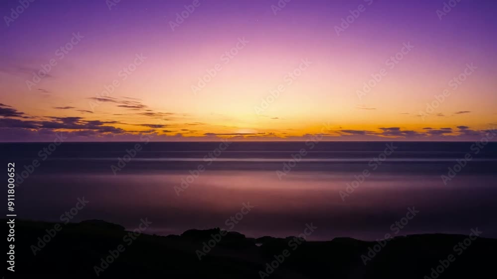 Timelapse of Sunset Over Calm Ocean with Purple and Orange Sky
Timelapse of Sunset Over Calm Ocean with Purple and Orange Sky