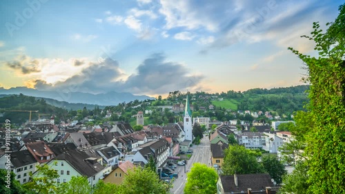 The City of Feldkirch in the State of Voralberg, Austria, towards the Swiss Mountains. Timelapse Video taken from the Schattenburg Castle. A day - night transition.