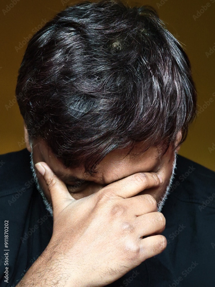 Portrait of a middle aged man who recently lost his father Portrait of a middle aged man who recently lost his father