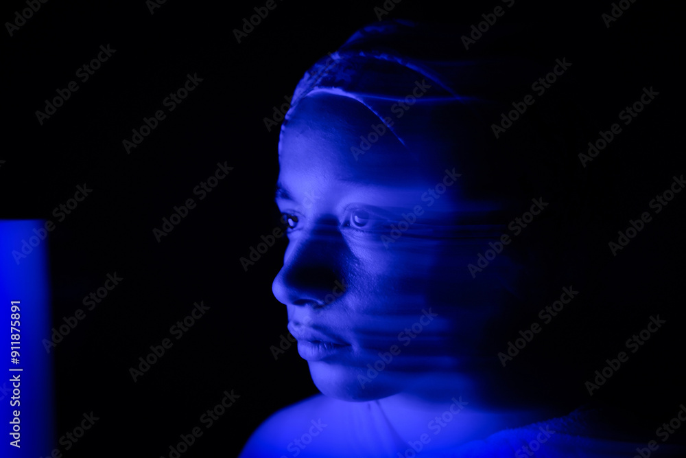 Blurred Portrait of a Muslim Woman with Blue Light Blurred Portrait of a Muslim Woman with Blue Light