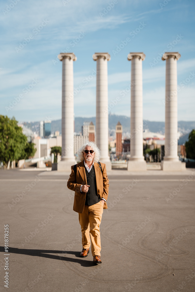 Elderly man walking in the city Elderly man walking in the city