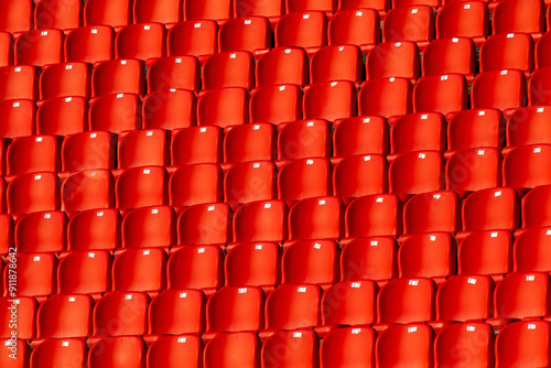 Rows of Empty Red Stadium Seats photo