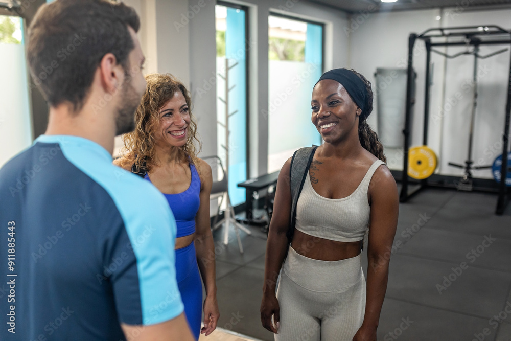 multiracial friends arriving at the gym multiracial friends arriving at the gym