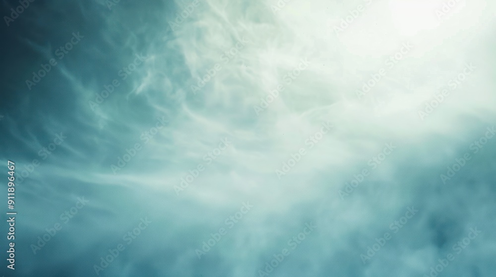 Fototapeta premium Abstract light blue textured background with soft clouds.