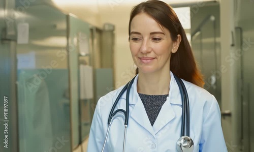 Portrait of smiling female doctor in white coat at hospitalHealthcare and medicine. photo