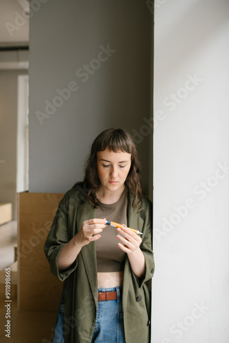 diabetic woman counting insulin units in cafe  photo