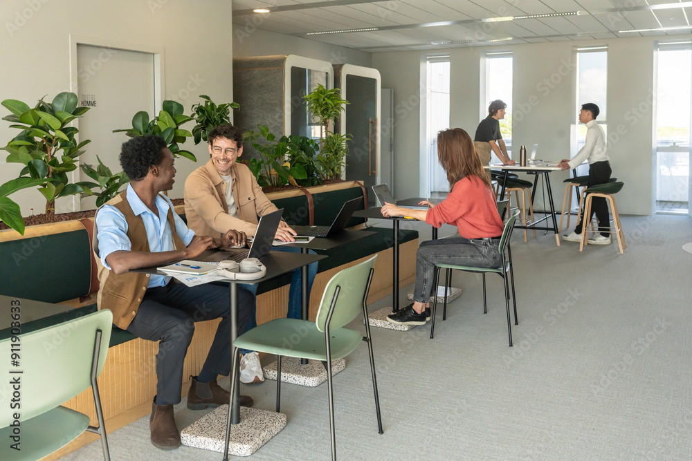 Team Collaborating In Modern Office Team Collaborating In Modern Office