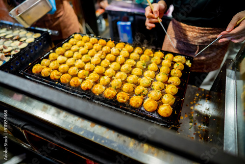 Canvas Print process to cooking takoyaki most popular delicious street food at Dotonbori or dotombori, Dotonbori the famous destination for traveller in Shinsaibashi, Osaka City, Osaka, Japan, Japanese food