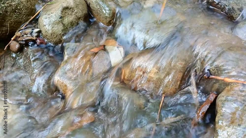 Clear river water flowing over natural rocks. Natural water flow video Clear river water flowing over natural rocks. Natural water flow video