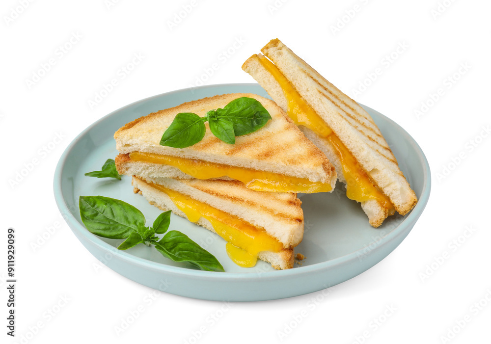 Pieces of toasted bread with melted cheese and basil isolated on white Pieces of toasted bread with melted cheese and basil isolated on white