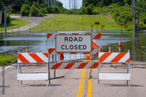 Flood or flooding. Florida flooding after hurricane or tropical storm. Flooded streets, road or highway. Hurricane season. Road closed. Destroyed after rain. City underwater. United States of America photo