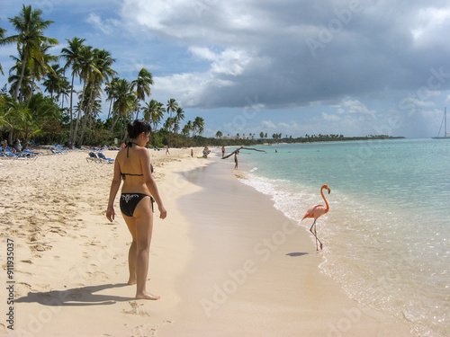 Woman at Beach in Caribbean with a Flamingo photo