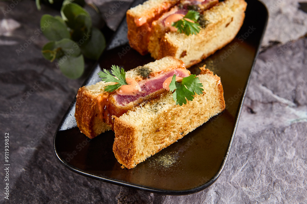 Japanese Sando Sandwich with Tuna on a Dark Slate Background Japanese Sando Sandwich with Tuna on a Dark Slate Background
