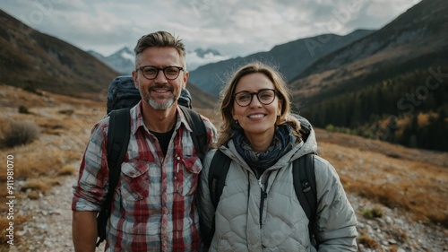 Man and woman dressed to travel wear glasses