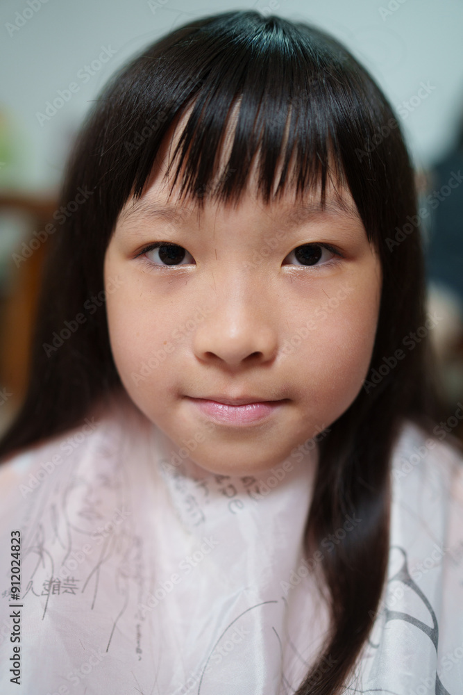 Asian little girl hair cutting portrait at home Asian little girl hair cutting portrait at home