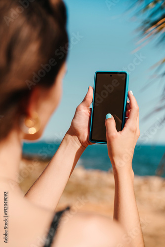 Woman's hands holding phone