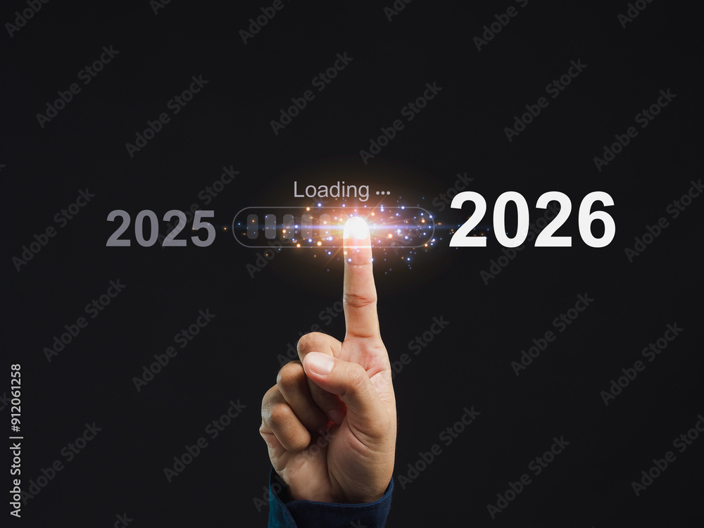 Hand pointing at progress bar loading 2026. Concept of future and technology. Hand pointing at progress bar loading 2026. Concept of future and technology.
