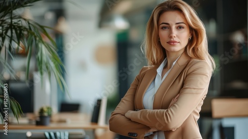 Smiling confident businesswoman with arms crossed standing on balcony