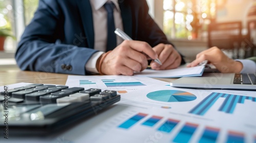 Business Team Analyzing Financial Charts and Data