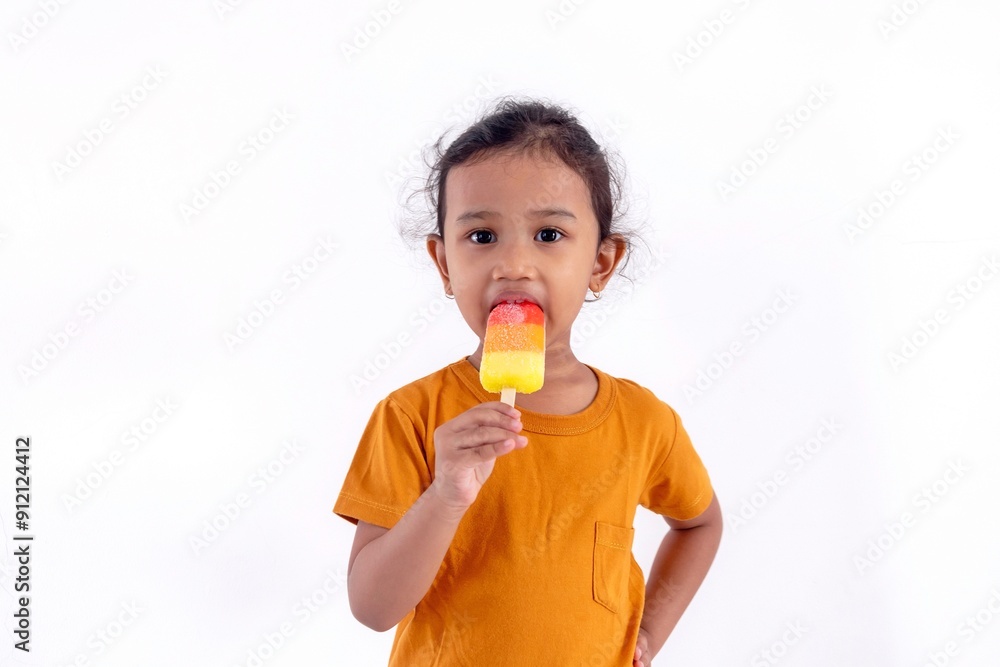 A cute Asian girl enjoying an ice cream, on a white background A cute Asian girl enjoying an ice cream, on a white background