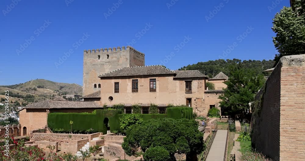Granada Spain Alhambra Palace courtyard garden. The Alhambra a palace and fortress complex in Granada, Andalusia, Spain. Famous monuments of Islamic architecture in the world. Built in 1238. Granada Spain Alhambra Palace courtyard garden. The Alhambra a palace and fortress complex in Granada, Andalusia, Spain. Famous monuments of Islamic architecture in the world. Built in 1238.