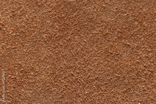 Natural suede, brown color. Background or texture sample, studio shot.