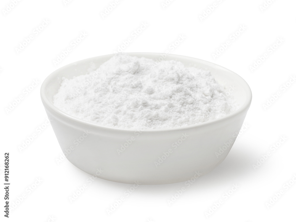 White ceramic plate full of powdered sugar, isolated on a white background White ceramic plate full of powdered sugar, isolated on a white background