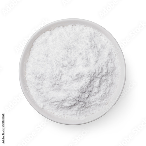 Full plate of powdered sugar isolated on white background, top view
