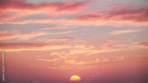 Sunset sky in the morning with sunrise and soft pink clouds with yellow tones, happy,day, back ground