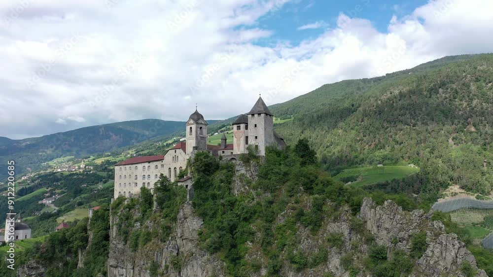 Aerial view of Castle on the rock, vineyards and winery on a sunny summer day Bolzano Italy Aerial view of Castle on the rock, vineyards and winery on a sunny summer day Bolzano Italy