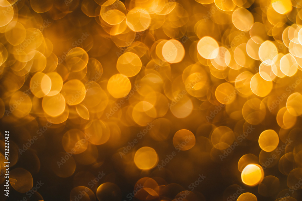 small Golden bokeh lights background small Golden bokeh lights background