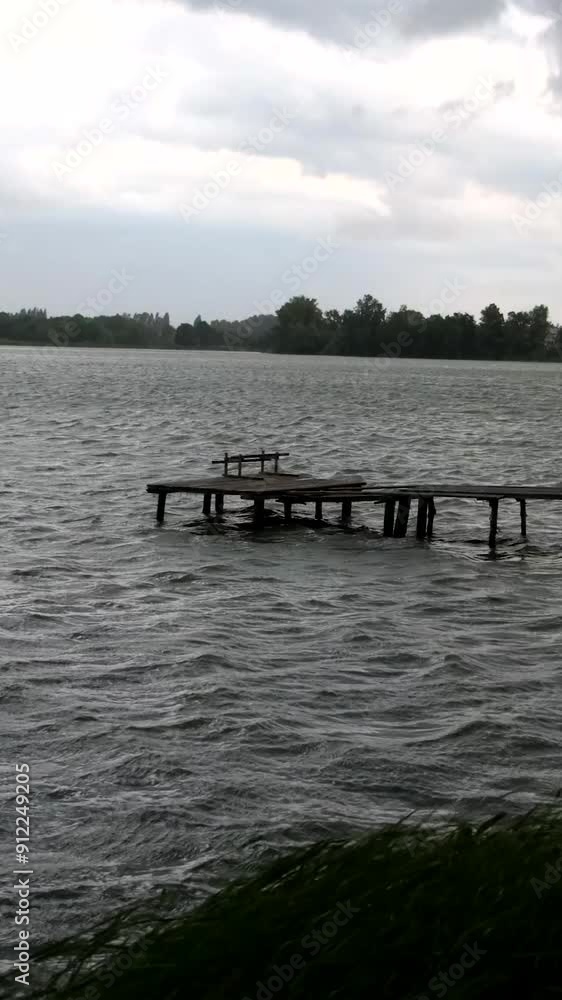 Strong wind on the lake in the evening. Strong wind on the lake in the evening.