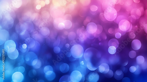 Soft abstract background with bright bokeh circles, iridescent shades of pink and blue. The lighting effects create a festive and magical mood.