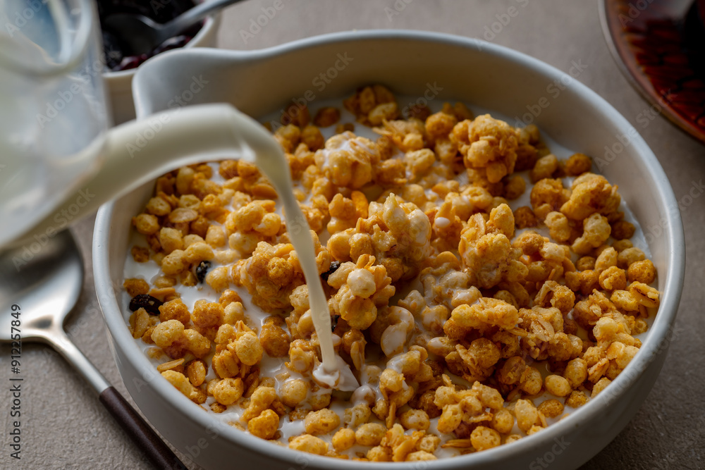 Milk and granola.
Breakfast image.
Milk and granola.
Breakfast image.
