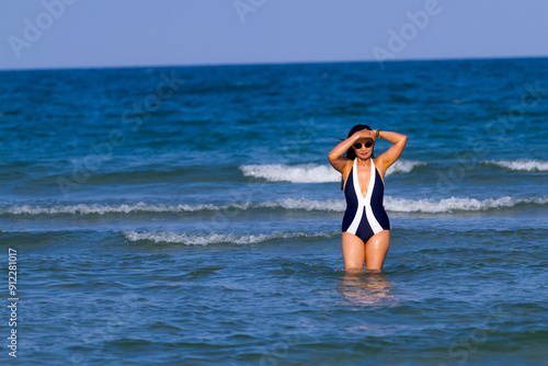 Woman body beautiful with bikini relax on beach