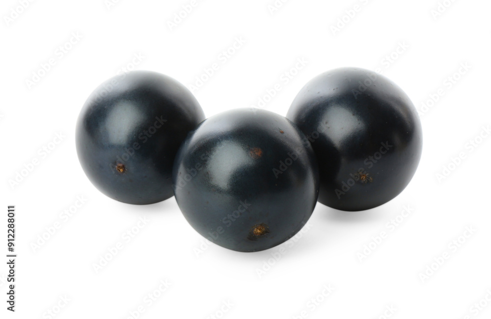 Three fresh ripe blackcurrants isolated on white Three fresh ripe blackcurrants isolated on white