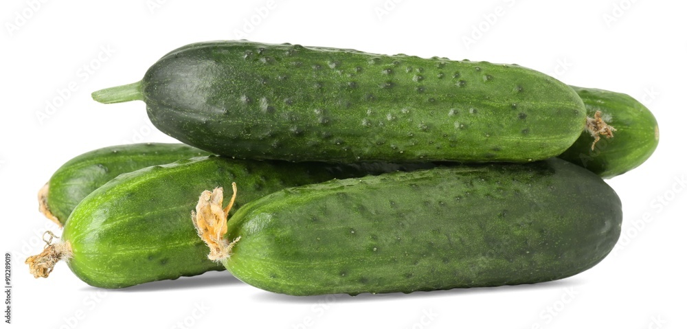 Pile of fresh cucumbers isolated on white Pile of fresh cucumbers isolated on white