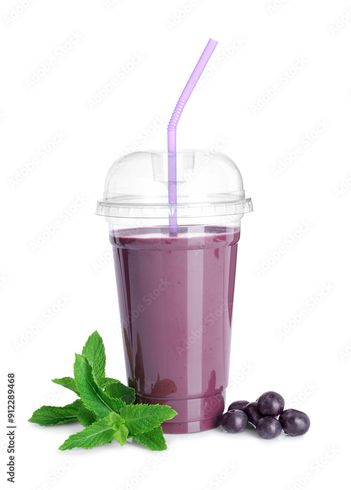 Tasty acai juice, mint and berries isolated on white Tasty acai juice, mint and berries isolated on white