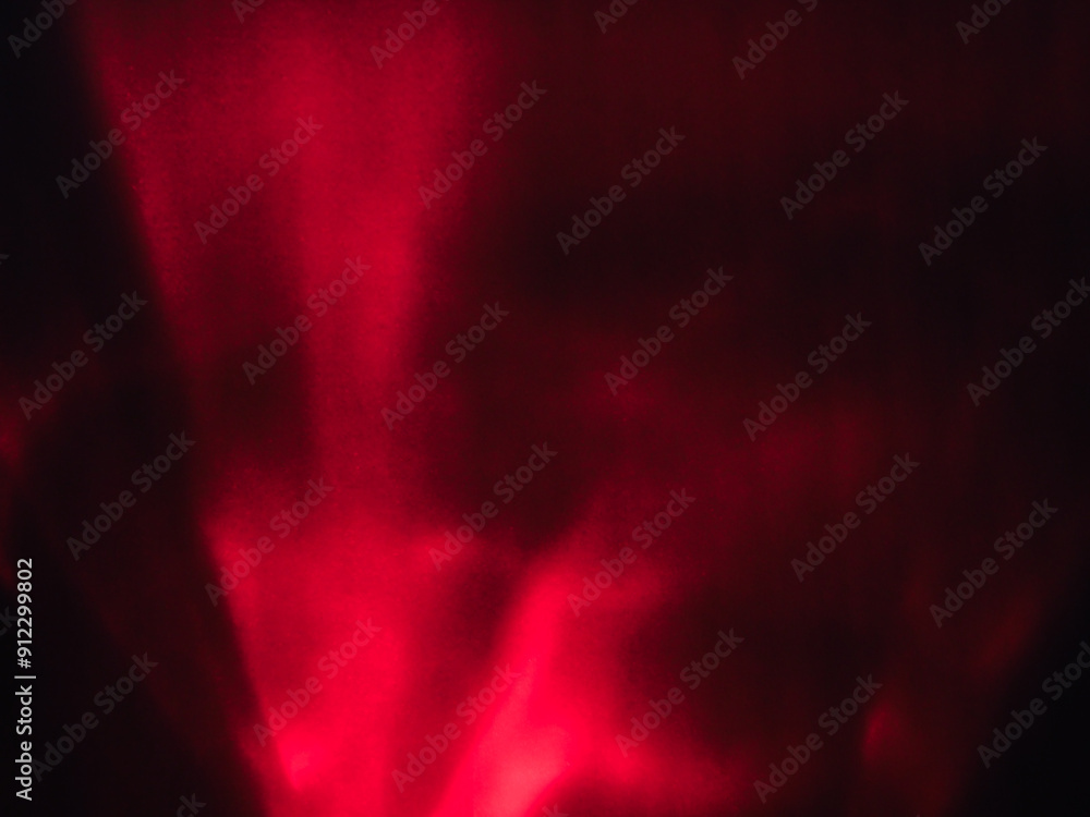 Red reflection in the dark for mysterious abstract background.        