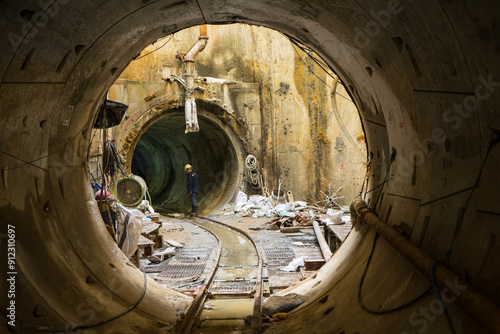 Underground tunnel infrastructure construction with engineer or technician control. Transport pipeline by Tunnel Boring machine.