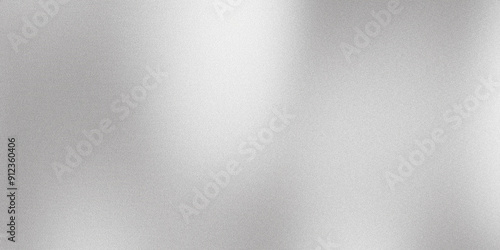 Abstract light silver background with grain texture reflecting light
