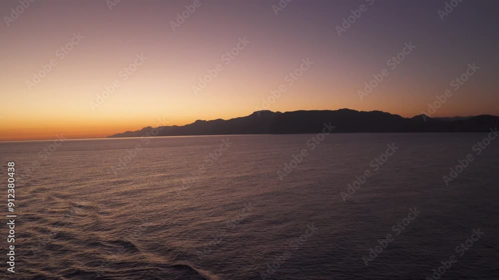 travel to Mallorca island in Spain view of the islet at distance during epic sunset travel to Mallorca island in Spain view of the islet at distance during epic sunset