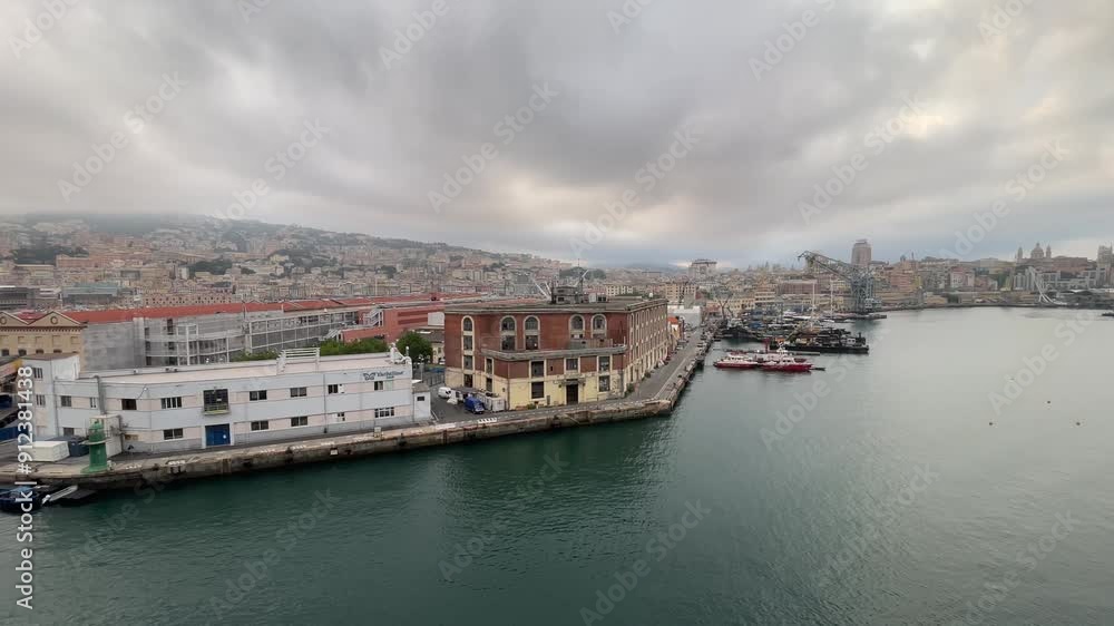 Aerial view of Genoa, Italy heavy storm cloudy sky drone fly above old town and port Aerial view of Genoa, Italy heavy storm cloudy sky drone fly above old town and port