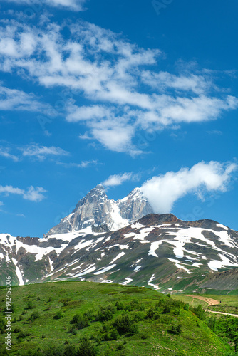 Magnificent mountains to trek in Mestia. Blooming mountain views in snowy weather in Mestia Georgia. Magnificent Mestia mountain views. Koruldi Lake trekking route. photo